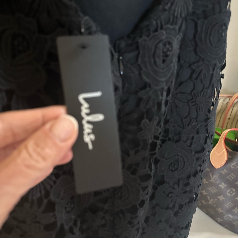 Lulu’s black crochet body con dress